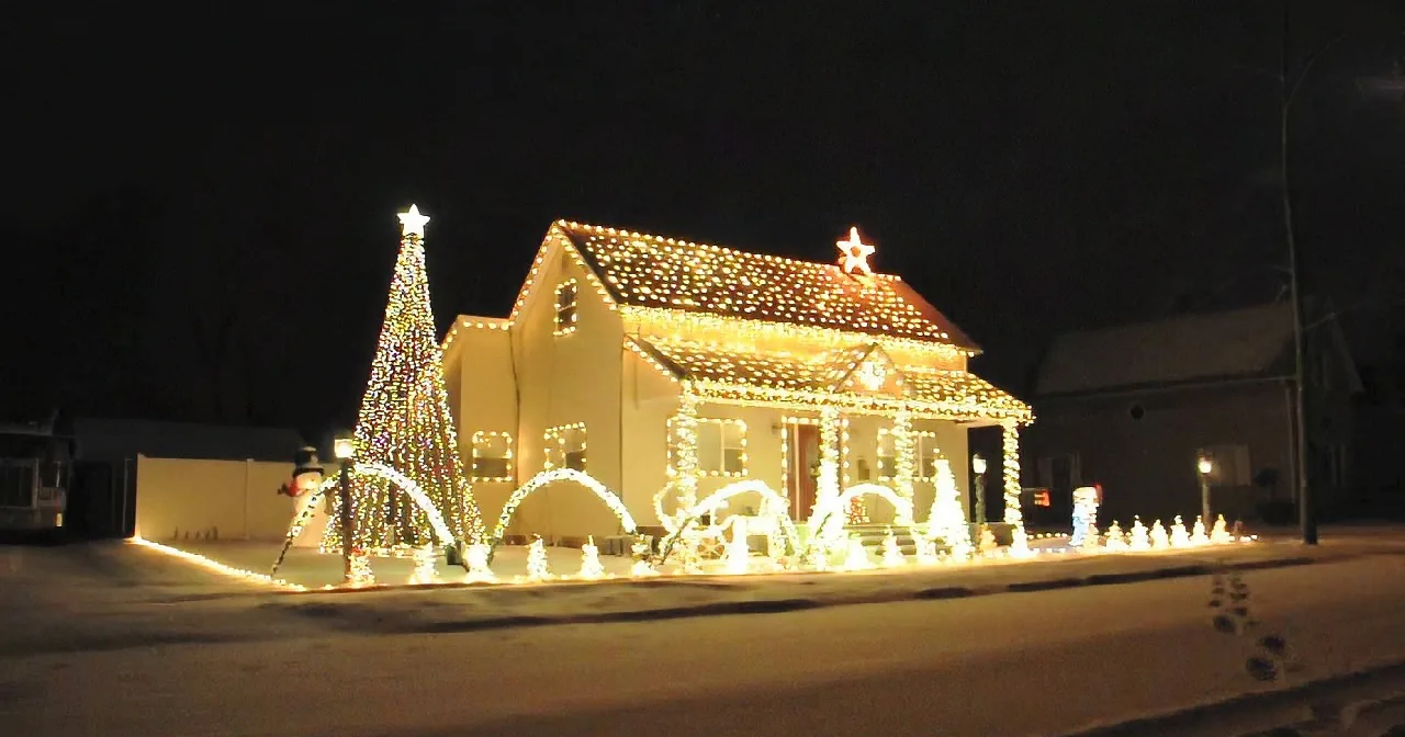 He Put Christmas Lights Around His House. Keep an Eye on That Star at the Top.