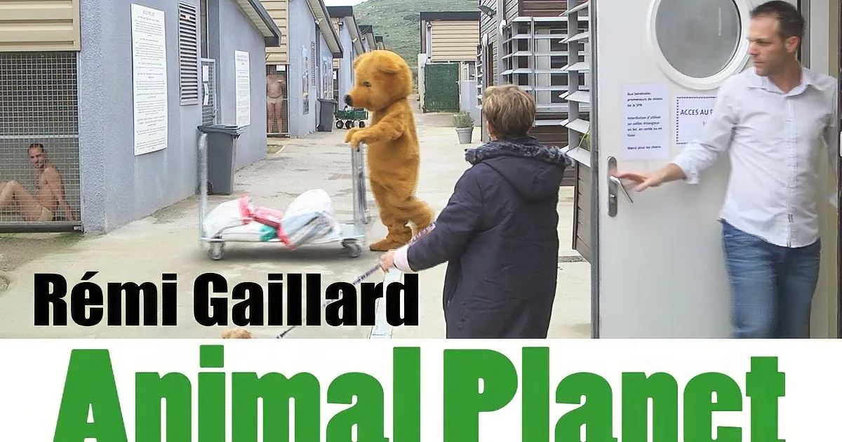 A person in a bear costume pushes a cart while another person opens a door, with a man in the background.