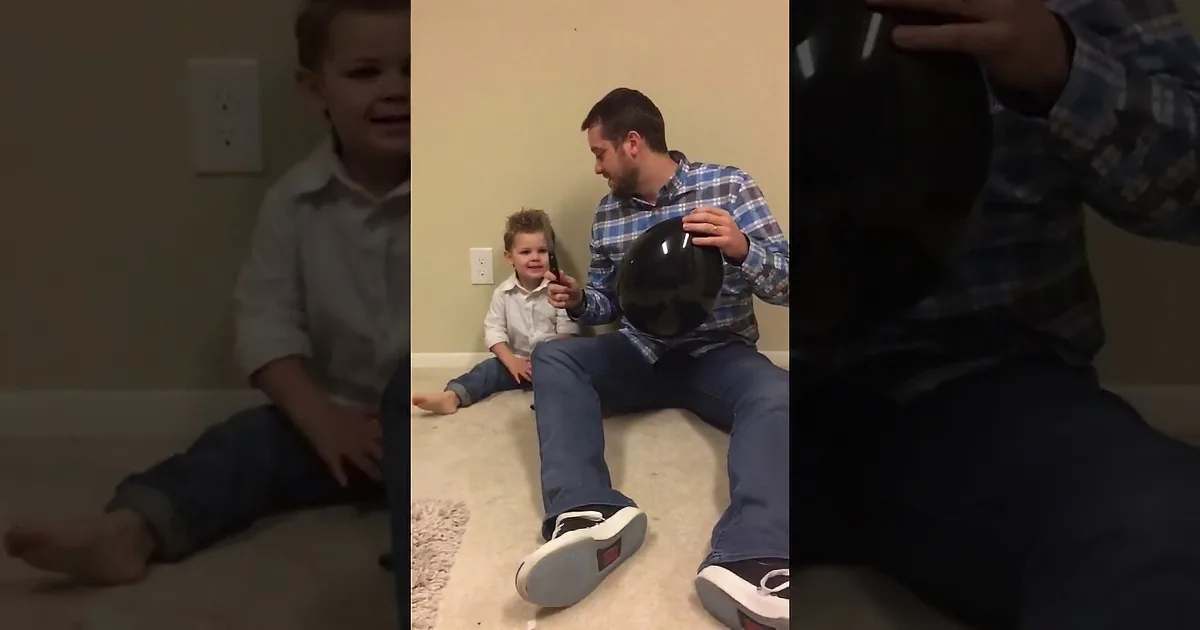 A Father and His Son Pop a Balloon to Find out the Gender of the Baby. Watch the Son''s Fun Reaction!