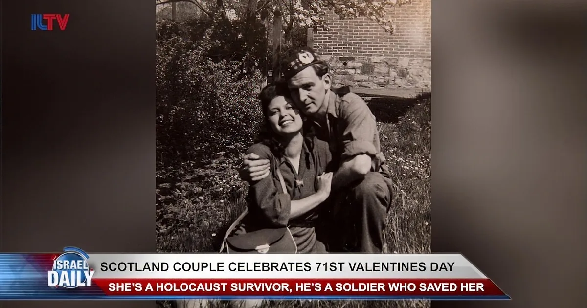 A couple embraces joyfully in a garden, surrounded by nature and brick walls.