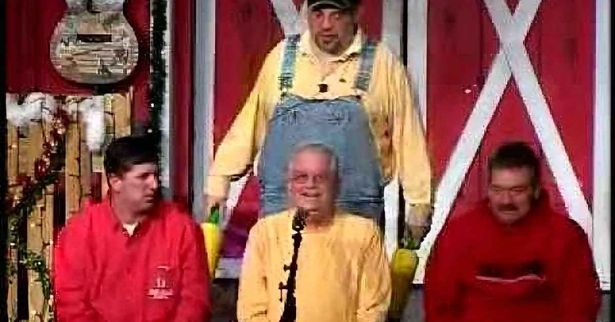 They Were Doing a Show Onstage. Now Pay Attention to the Man Sitting Down in the Yellow Shirt...