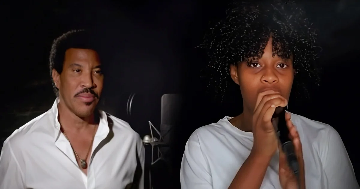 A man and woman sing into microphones in a dimly lit studio setting.