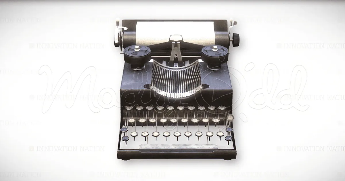 A vintage typewriter with a white sheet of paper is shown against a white background.