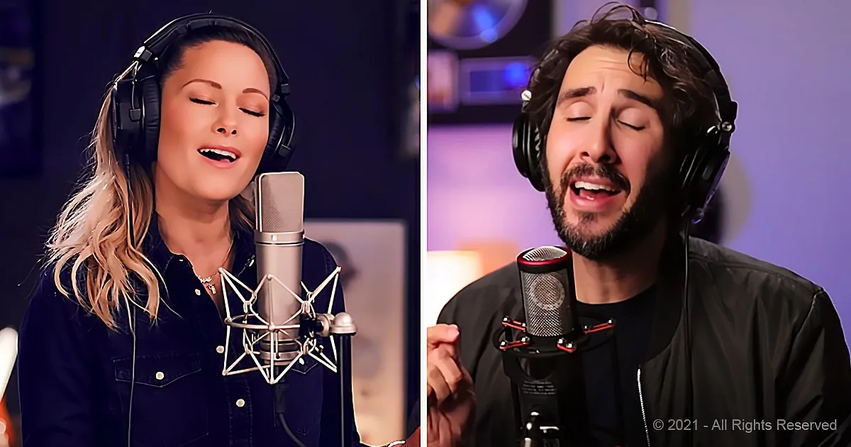 A woman and a man are singing into microphones, both wearing headphones, in a recording studio setting.