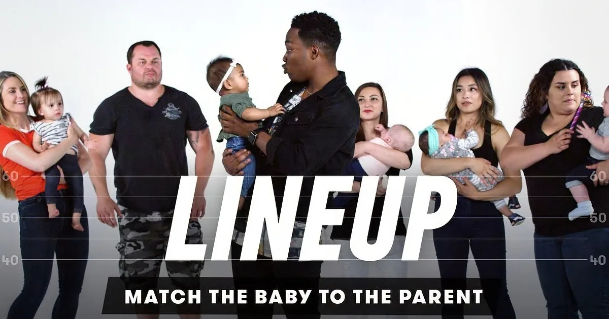A boy stands in the center, flanked by adults holding babies, all against a plain white background.
