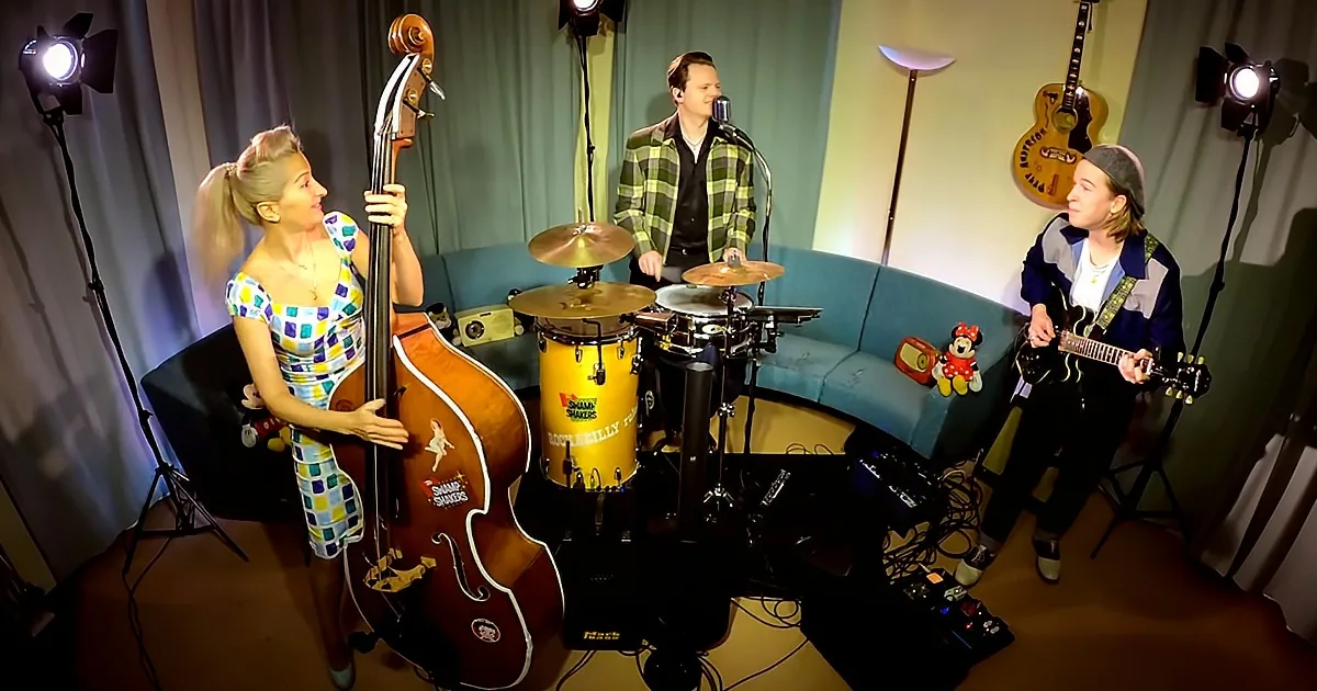 Rockabilly Trio Covers Elvis Presley''s ''My Baby Left Me'' in Peppy Performance