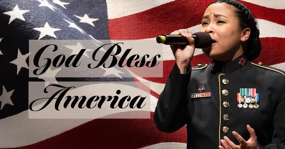 A woman in U.S. Army uniform sings into a microphone with headphones, red curtains behind her.