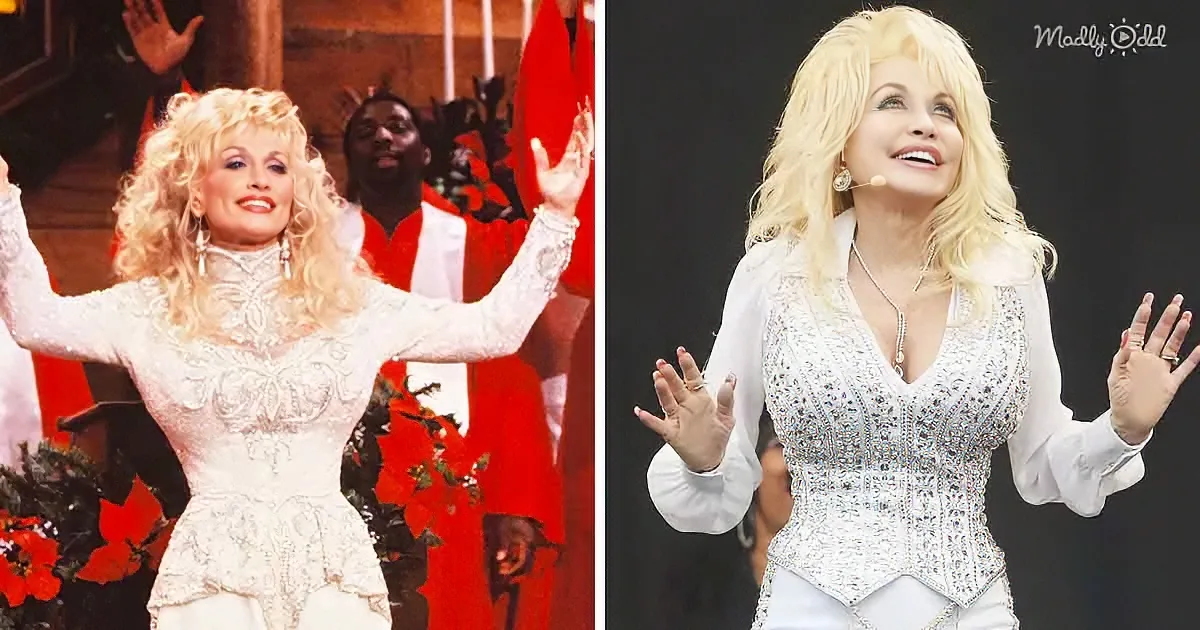 Dolly Parton, in a white sequined outfit, is performing with her hands raised, surrounded by a festive background.