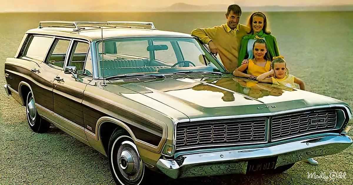 A vintage Ford LTD station wagon with a family posing on its hood, set against a scenic backdrop.