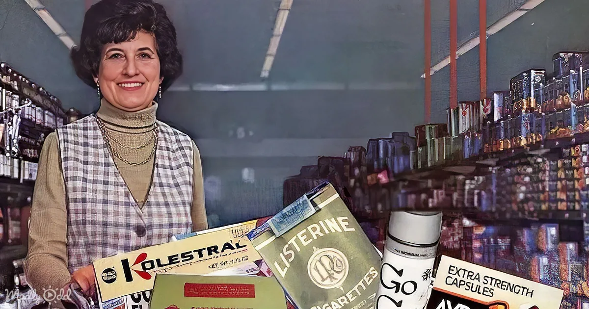 A woman smiles in a store aisle, holding boxes of Kolestral and Listerine products.