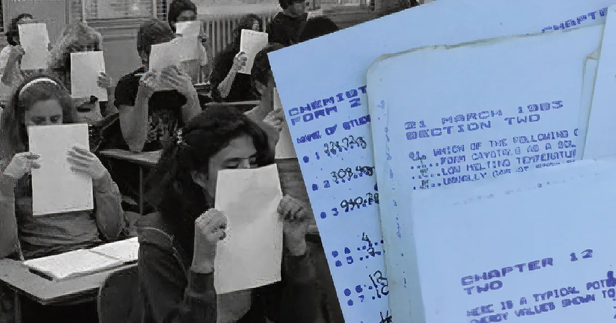 Students in a classroom holding papers, a slide shows a chemistry question dated 21 March 1983.