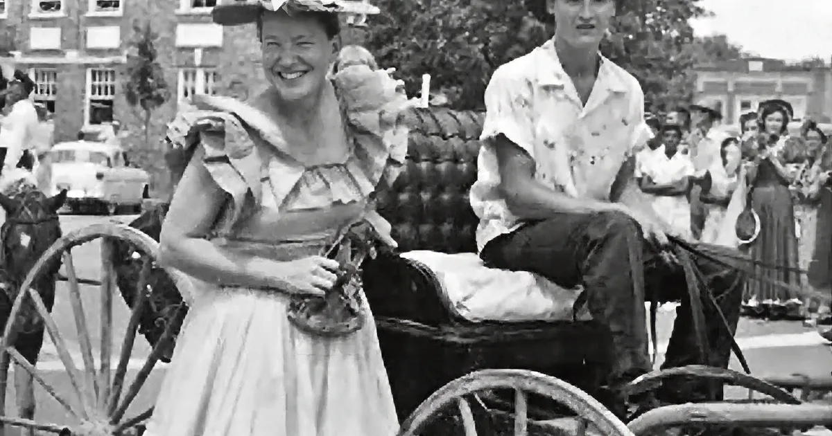 A vintage Minnie Pearl's Chicken package with floral pattern, photo of Minnie, and quote.
